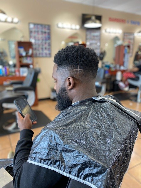 Client haircut by MiMi Da Barber