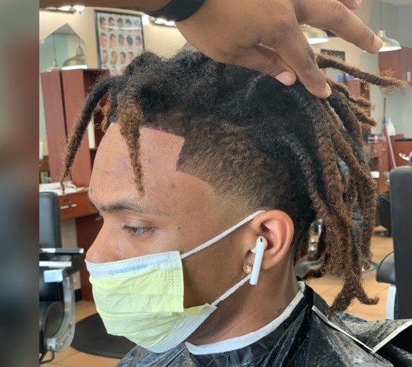 Client haircut by MiMi Da Barber
