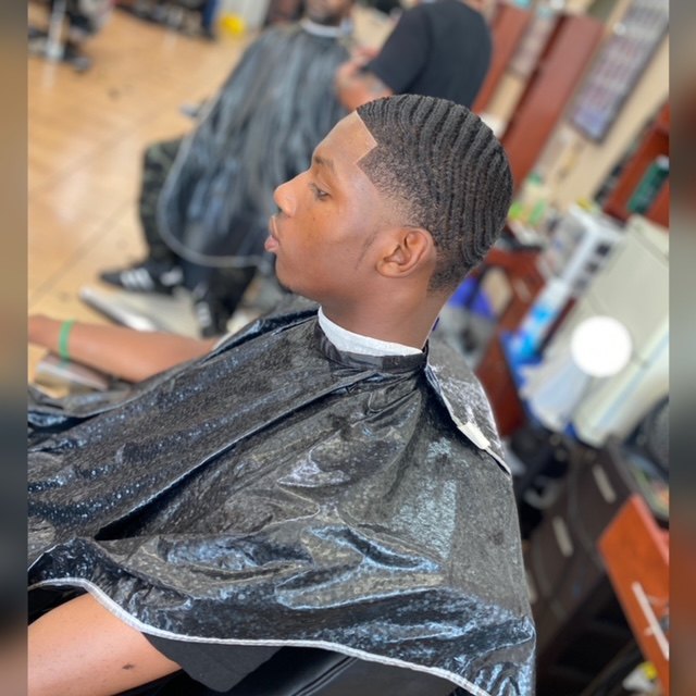 Client haircut by MiMi Da Barber