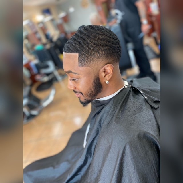 Client haircut by MiMi Da Barber